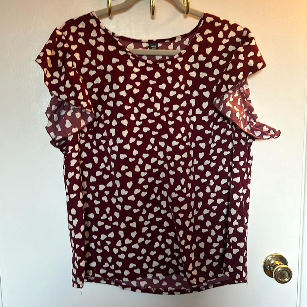 Burgundy top with hearts